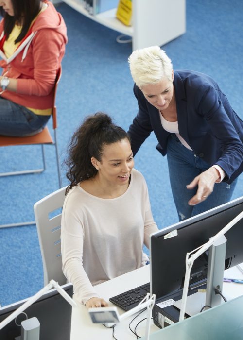 University students working in library